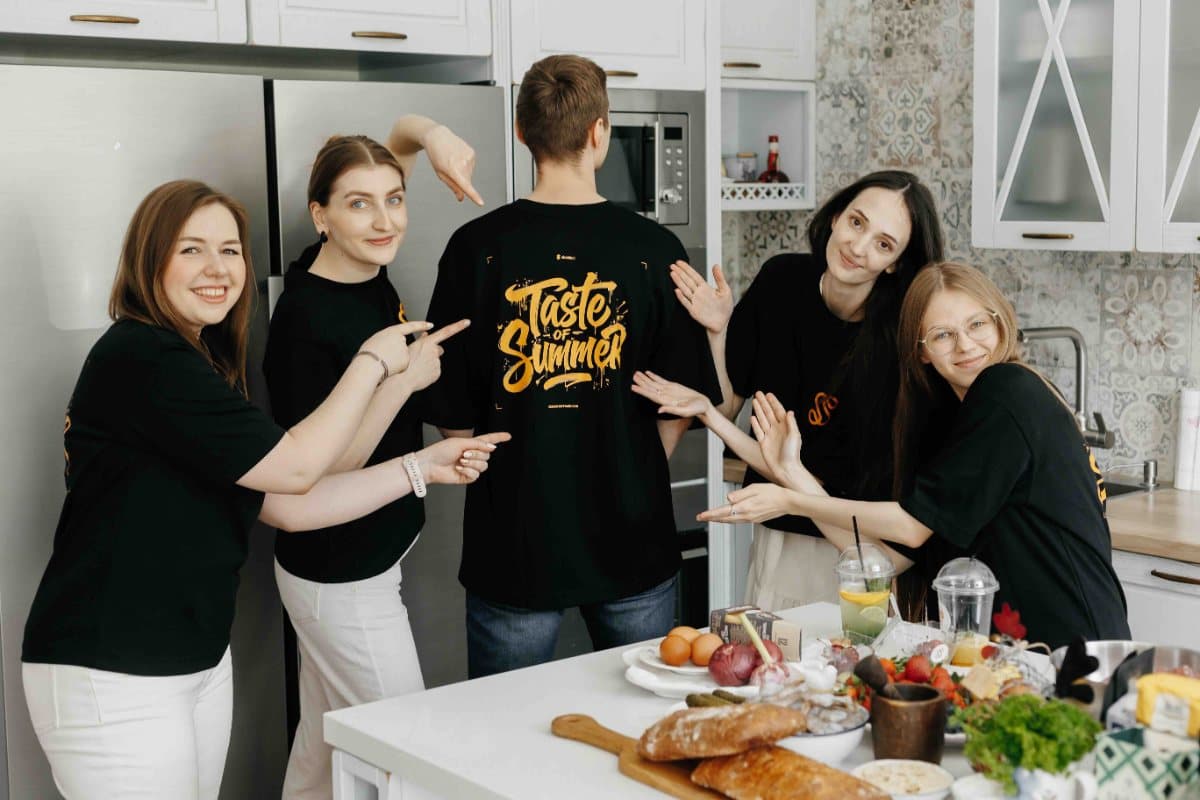 Team in branded Sidekick t-shirts
